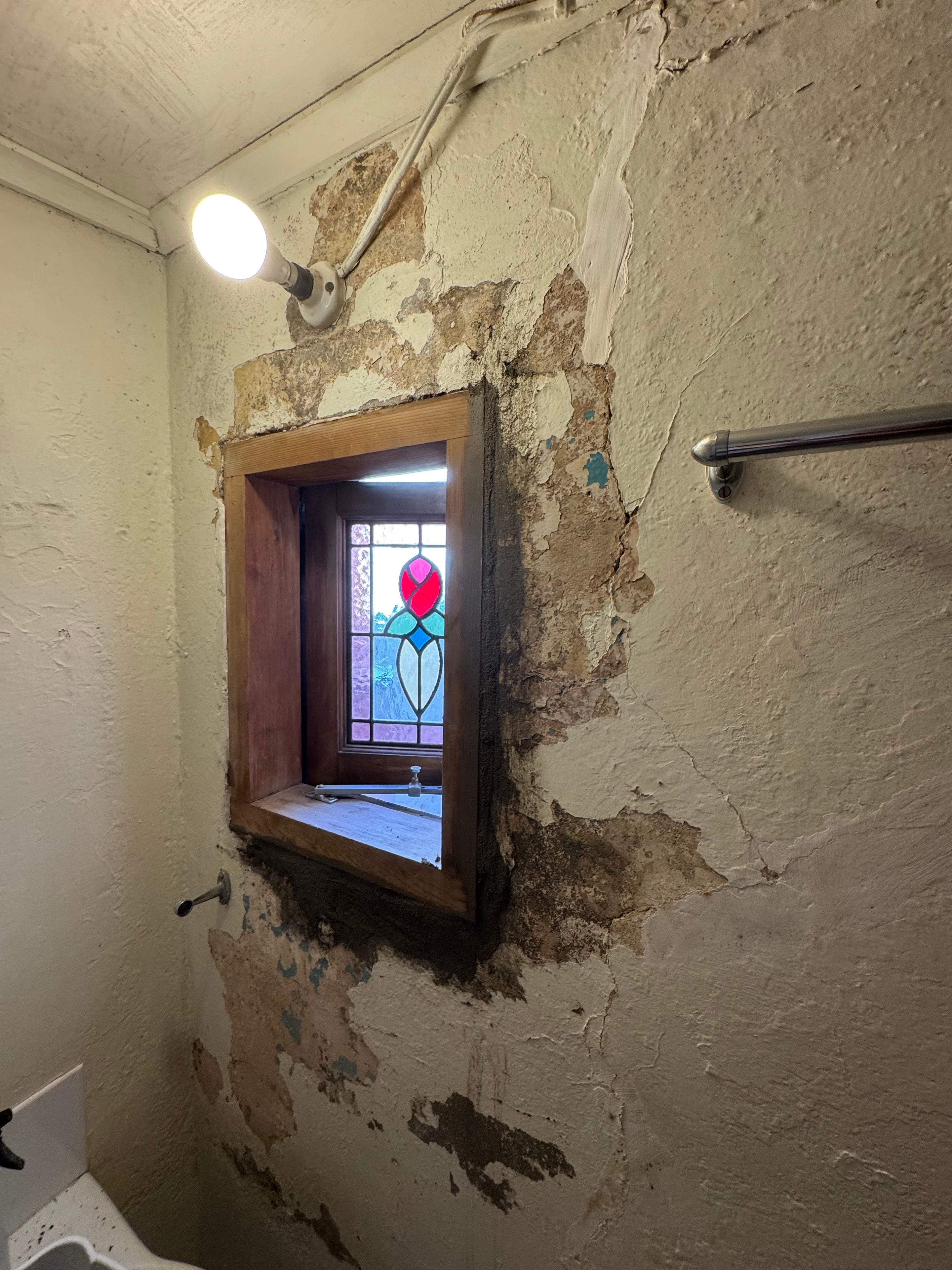 Room before painting — worn, faded surfaces